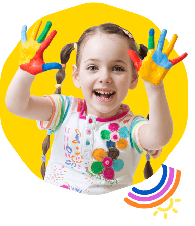baby girl smiling and her hands fills with beautiful colors