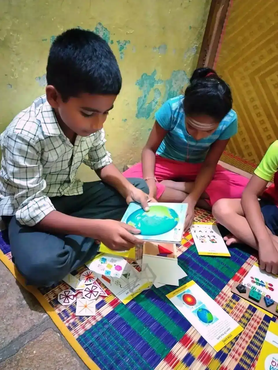 children doing stemsunq activities in community