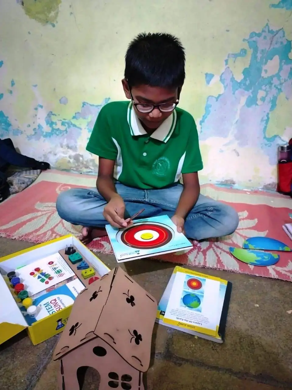 kid engaging in stemsunq community workshop