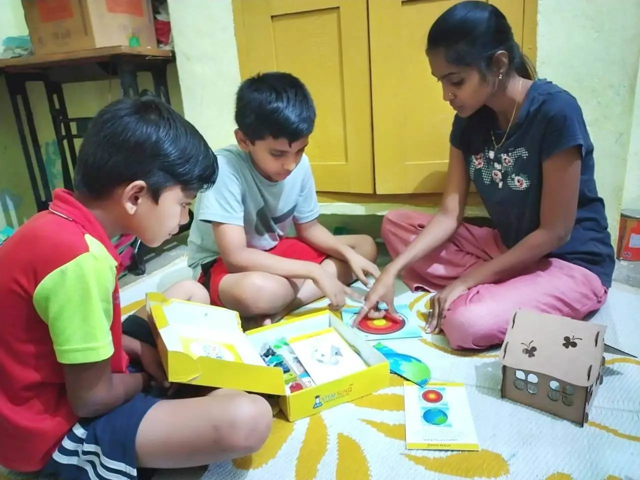 parent and children engaging in stem activities community workshop