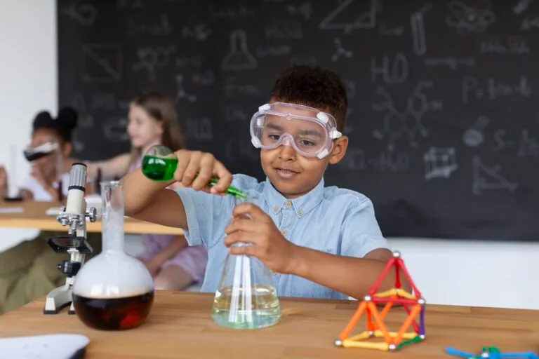 young-boy-learning-more-about-chemistry-class