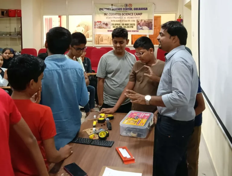 students-building-a-robot-car-model